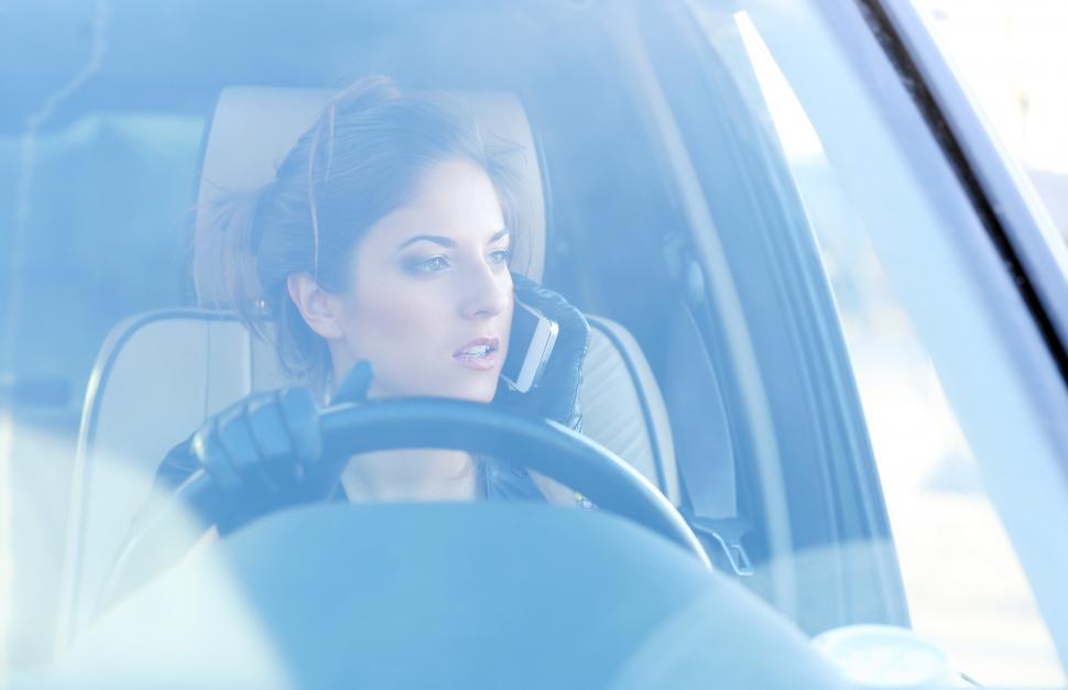 Free Image of Cool girl seen through windshield of car 