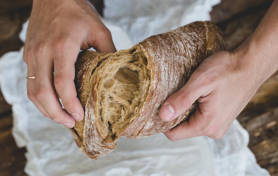 Free Image of Man with bread 