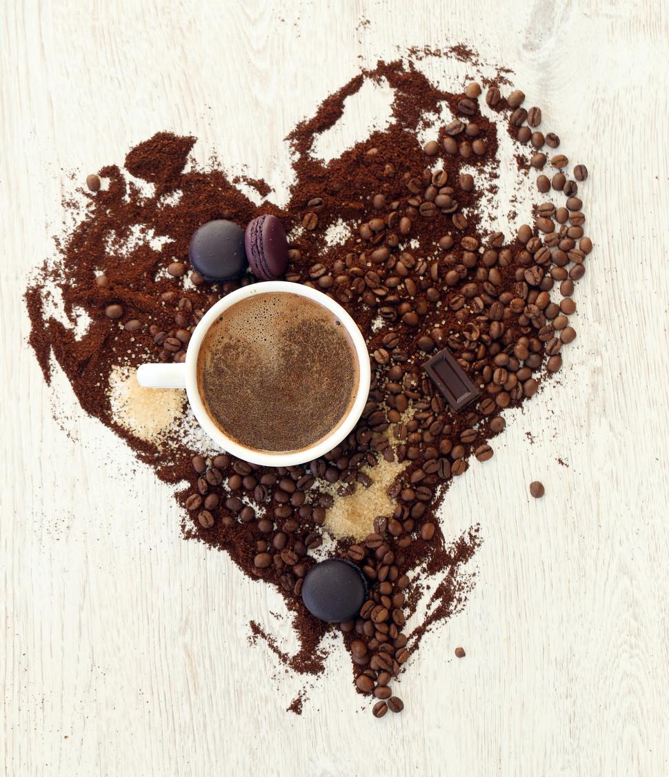 Free Image of Coffee heart made from coffee bean and grounds 