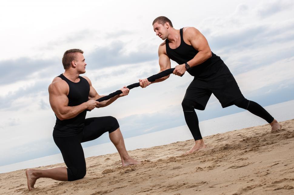 Free Image of Bodybuilders on the beach 