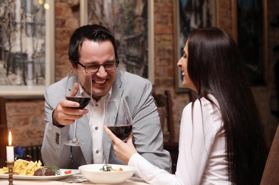 Free Image of Beautiful couple dining together 