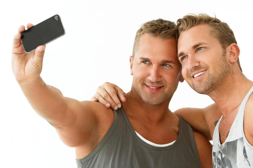 Free Image of Handsome guys at home taking a selfie 