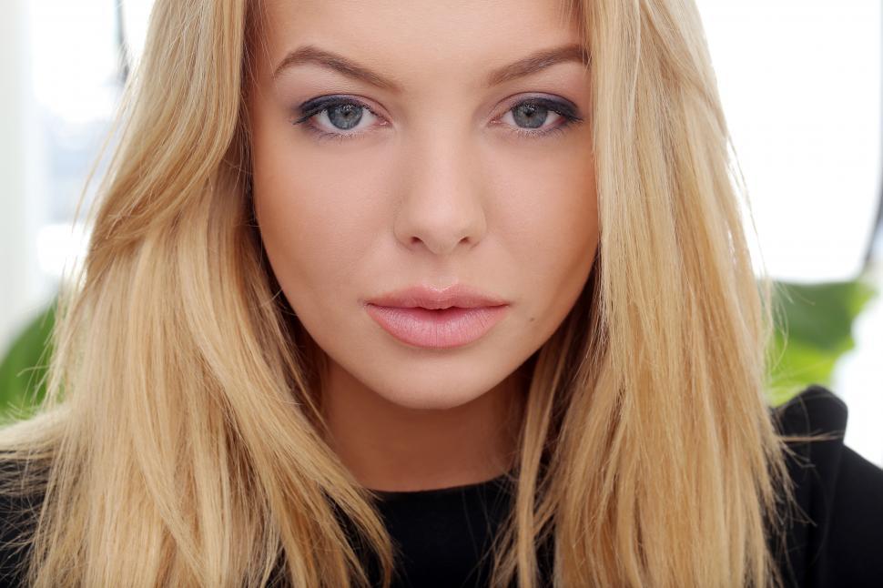 Free Image of Young woman looking at the camera 