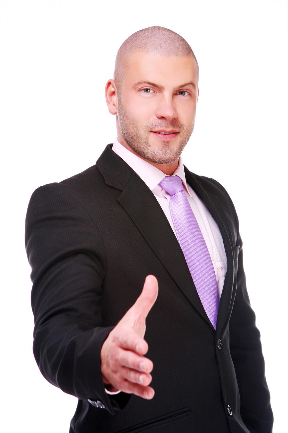 Free Image of Businessman reaching for handshake 