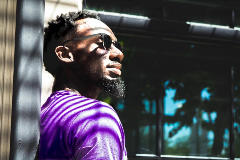 Free Image of Young Man in Purple T-shirt 