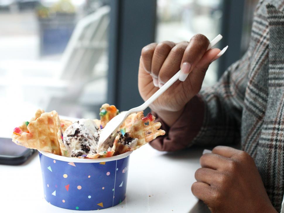 Free Image of Waffle cup ice cream bowl and hands 