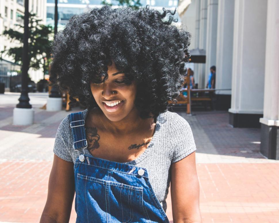 Free Image of Young Woman in dungarees 