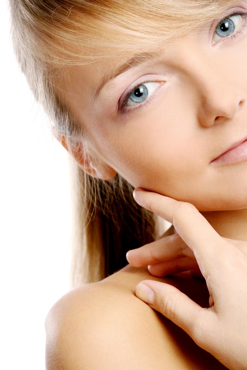 Free Image of young and attractive woman in bright studio lighting 