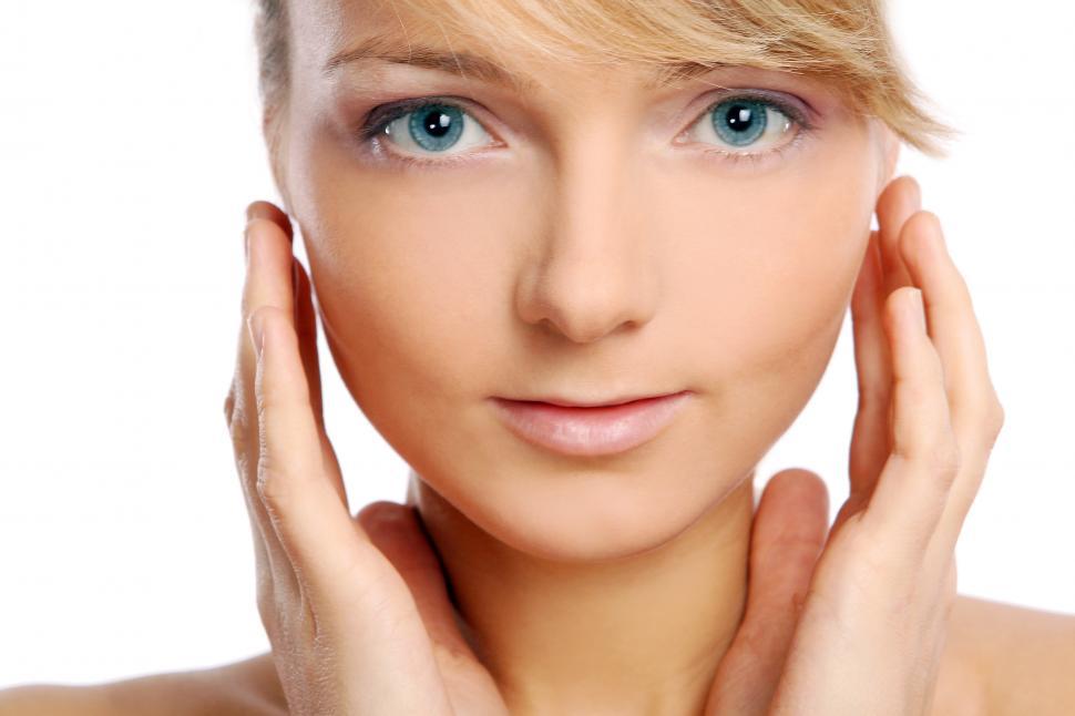 Free Image of young attractive woman on white facing camera 