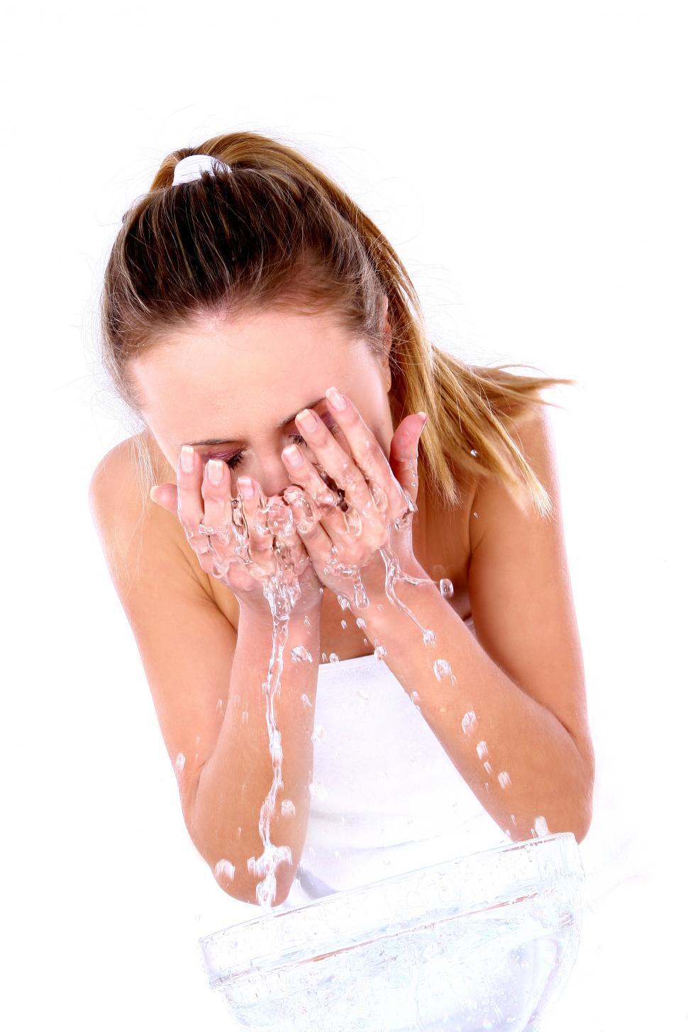 Free Image of Splashing water on the face 