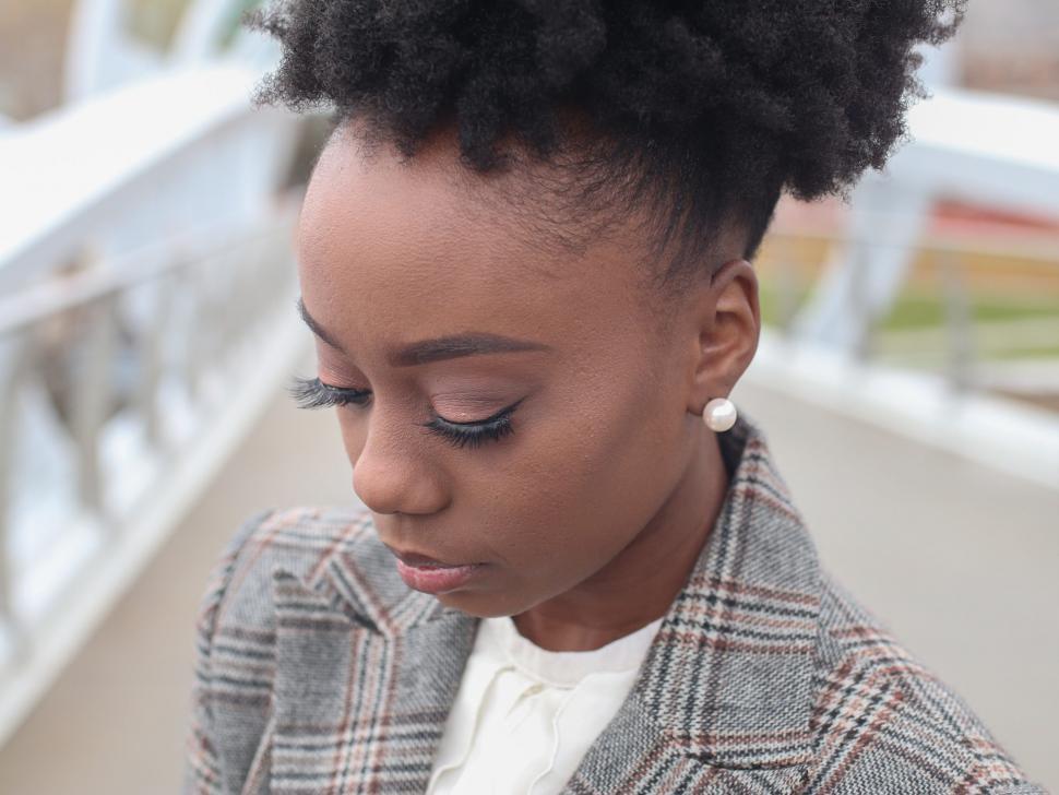 Free Image of Young business woman in tweed blazer 