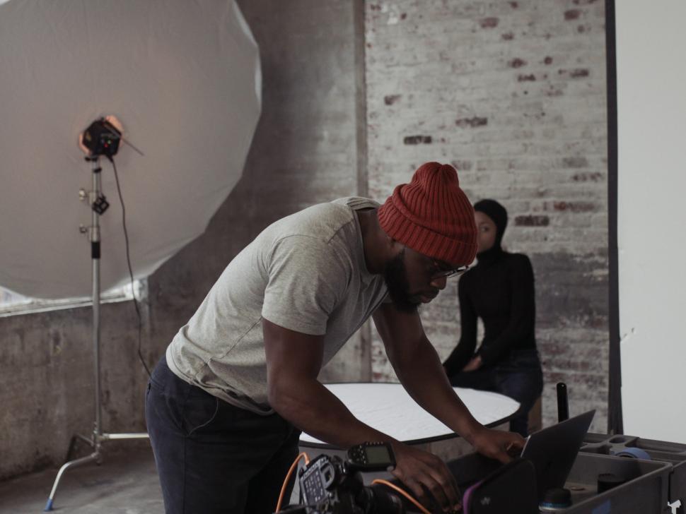 Free Image of Young Man and Female Model in a photo studio 