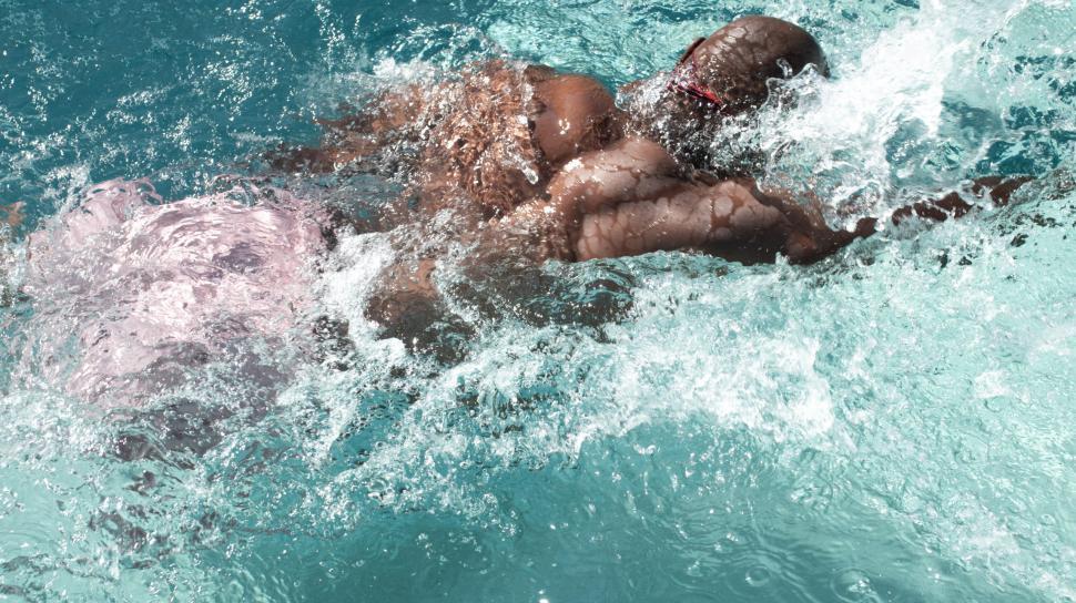 Free Image of Rear View of Young Man in Pool 