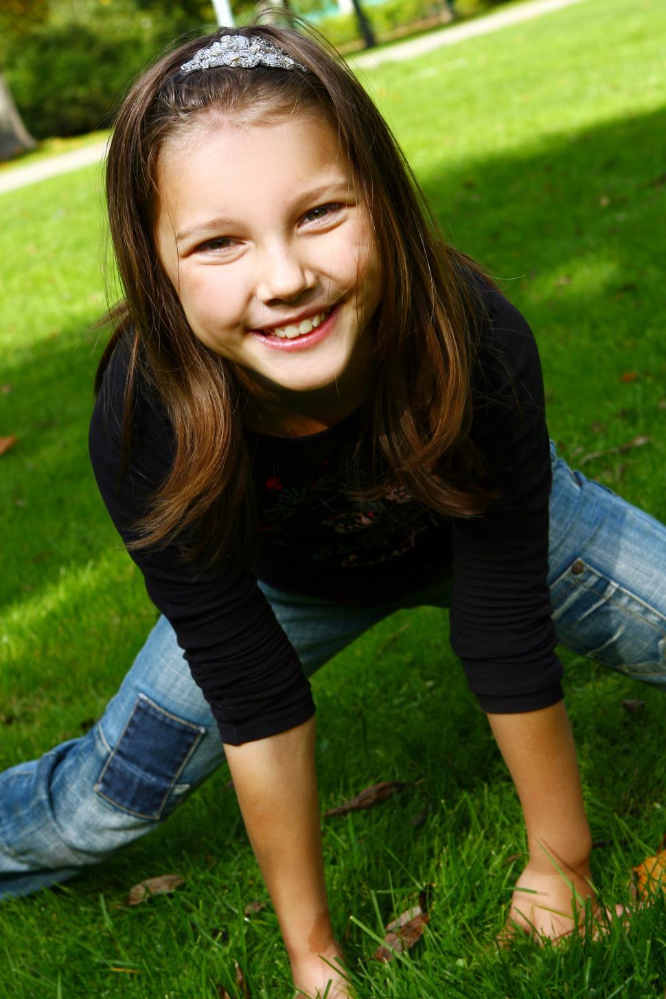 Free Image of Cute girl posing in park 