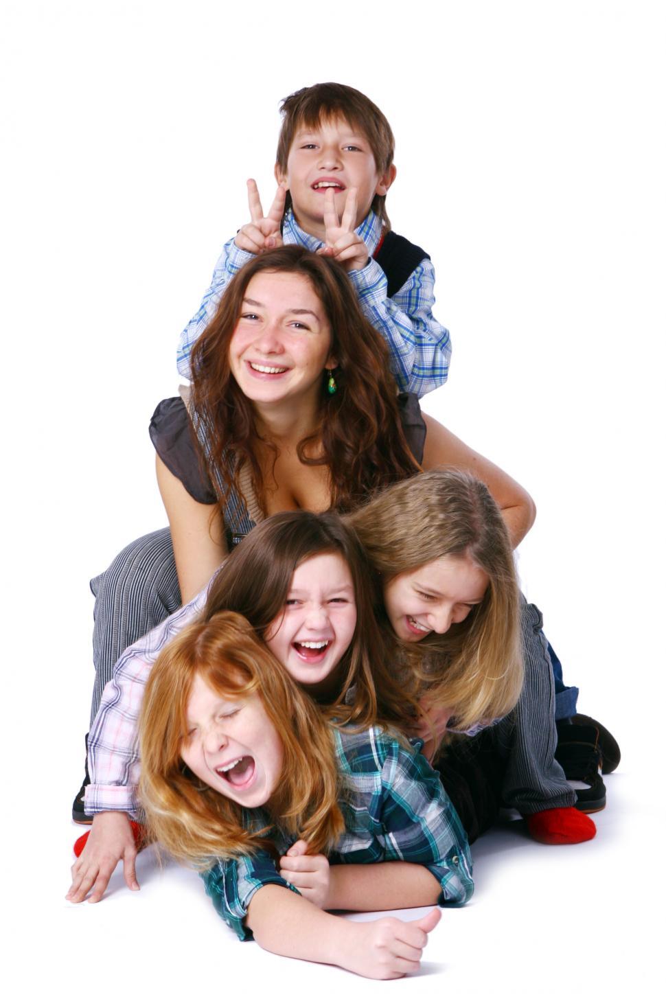Free Image of Pile of cute and happy kids posing on white background 