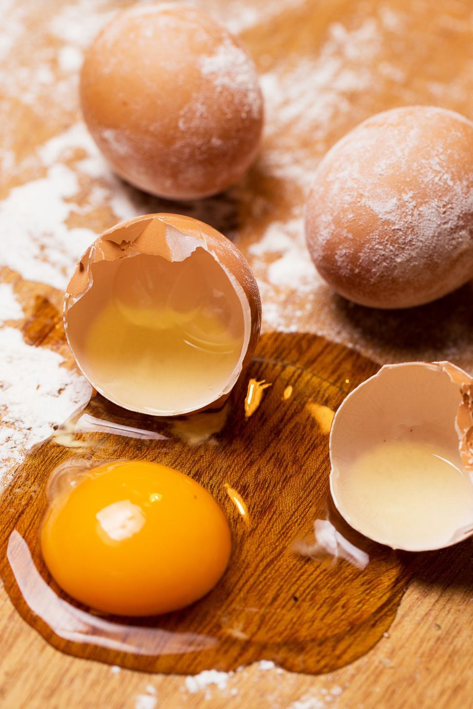 Free Image of Cooking, close-up. Bunch of eggs in the flour 