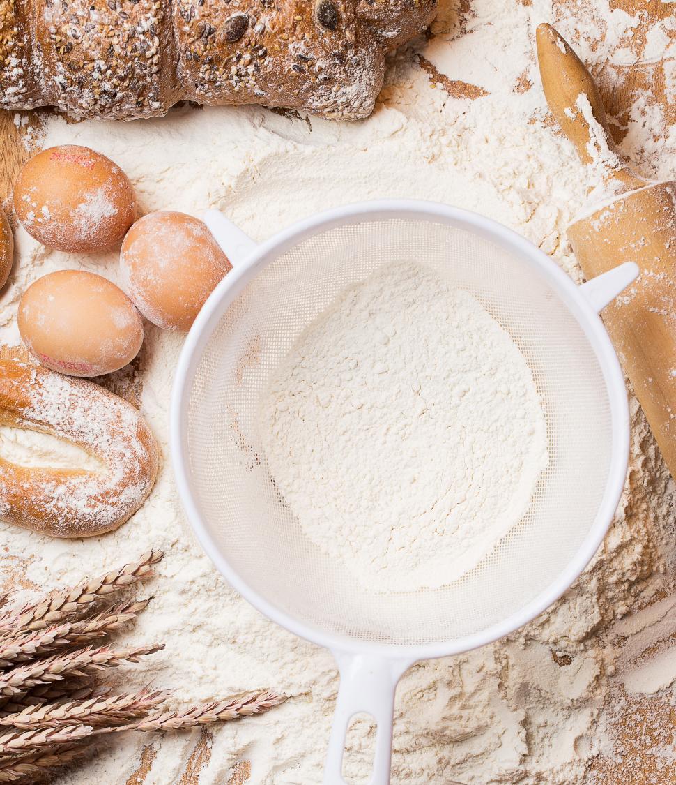Free Image of Cooking. White sieve with flour and bread 