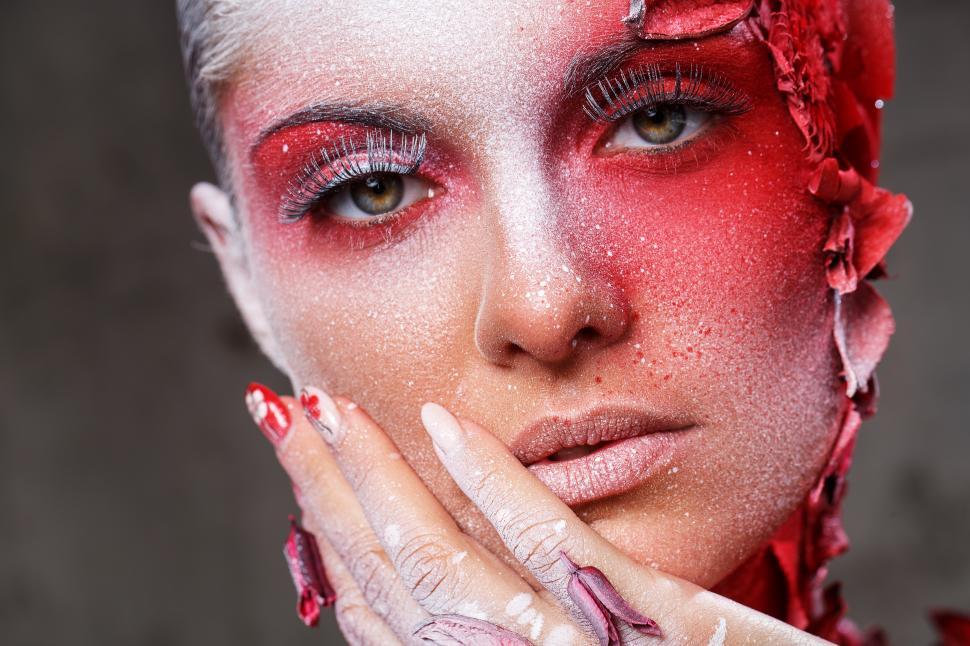 Free Image of Model with exotic red and white makeup 