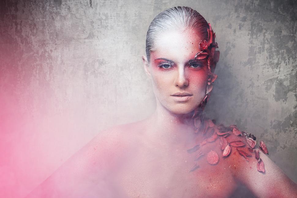 Free Image of Beautiful, artistic makeup in surreal scene 
