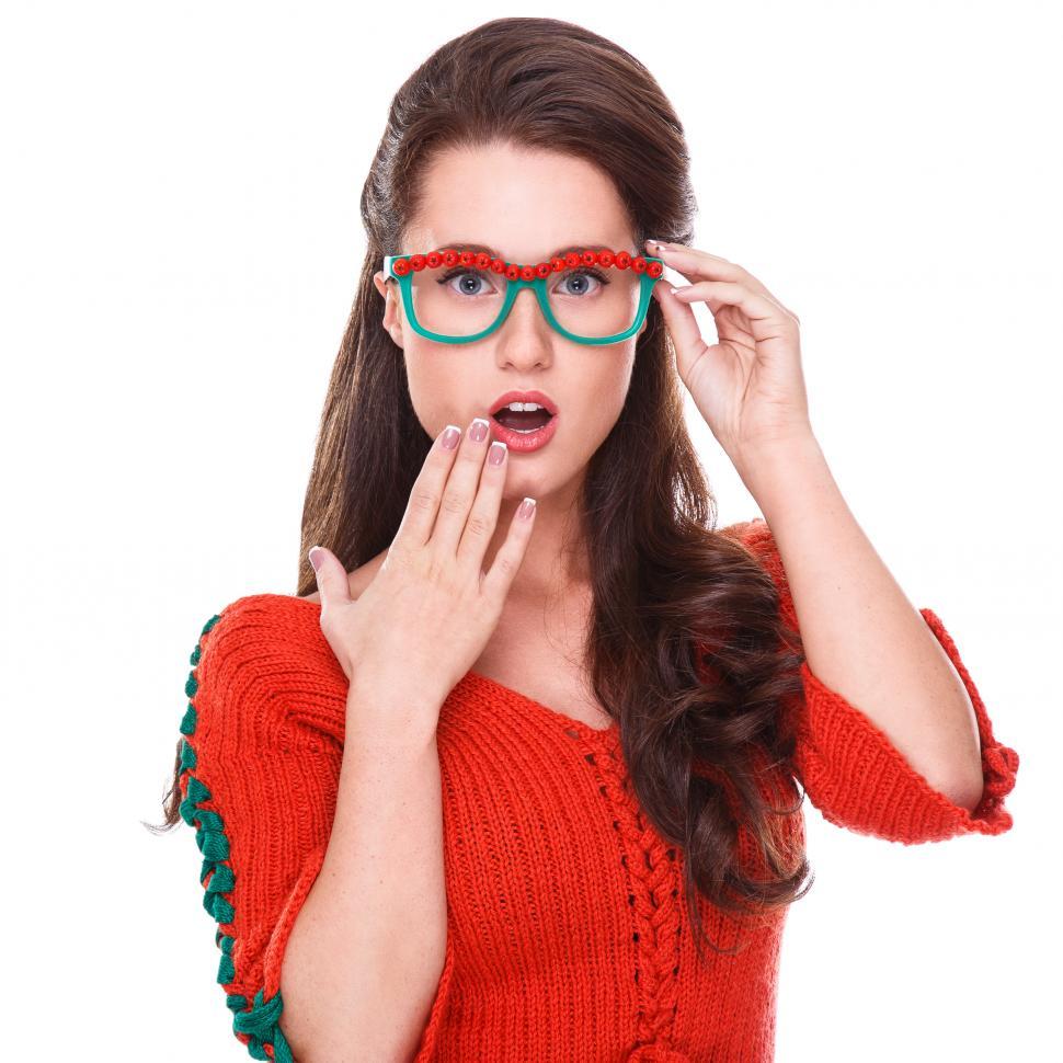 Free Image of Young woman in quirky glasses and red sweater 
