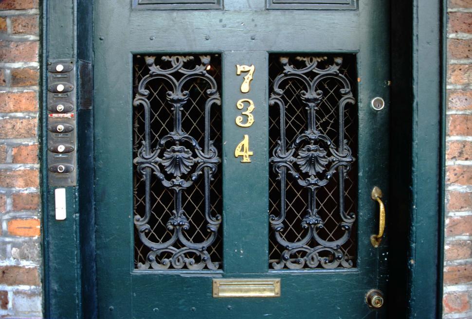 Free Image of Old doorway with ironwork 