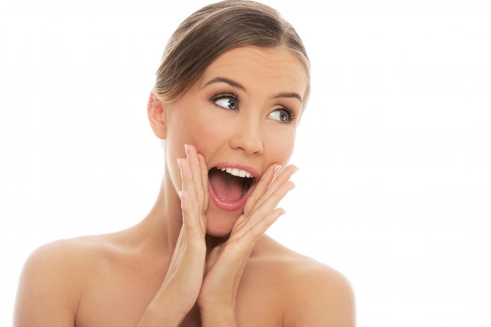 Free Image of Attractive woman exclaiming with open mouth 