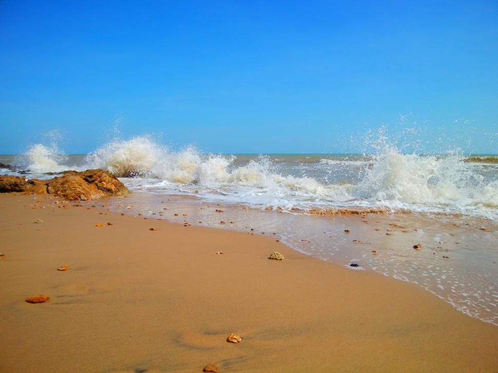Free Image of Sea water splashing on the beach  
