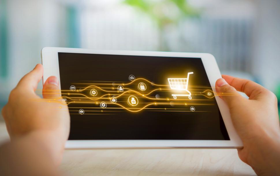 Free Image of Online Shopping - Person with Tablet and Virtual Shopping Cart 