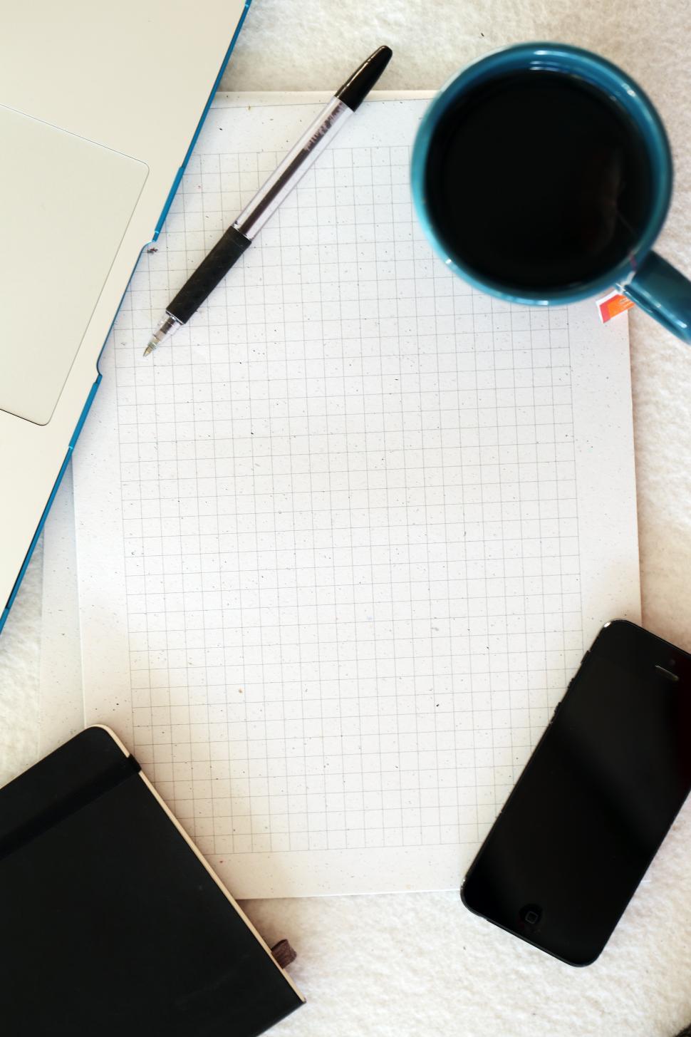Free Image of Laptop, mug and notepad frame empty area 