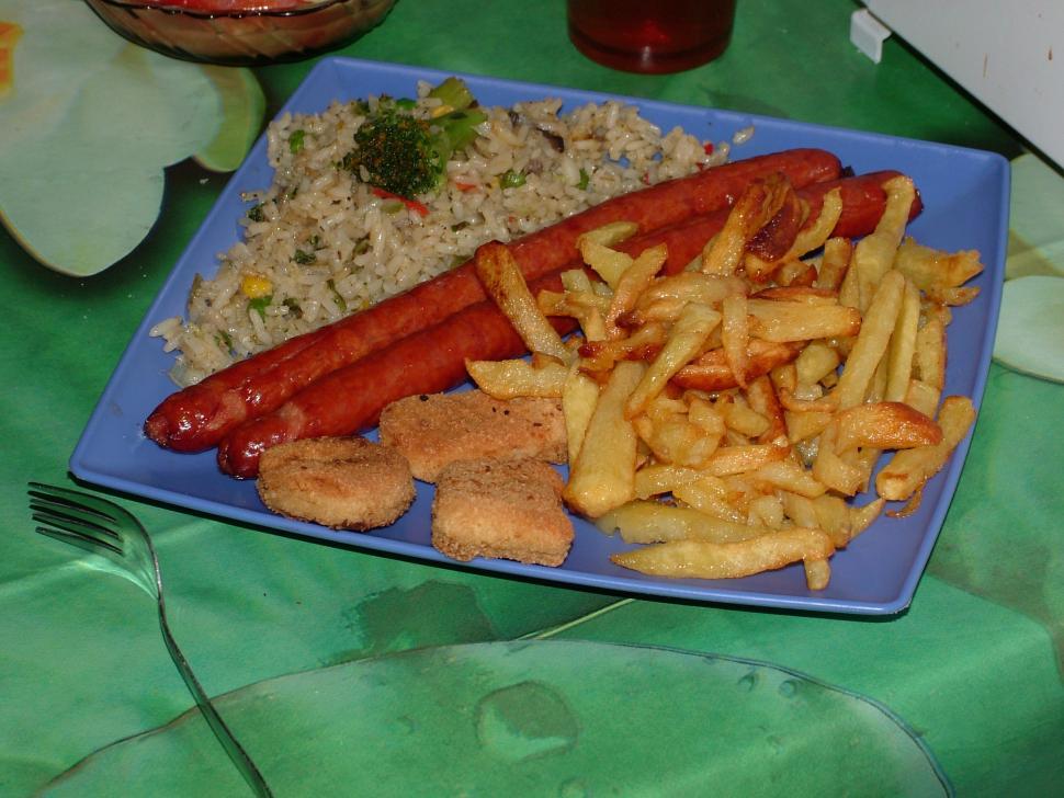 Free Image of Rice with vegetables, sausages and french fries 