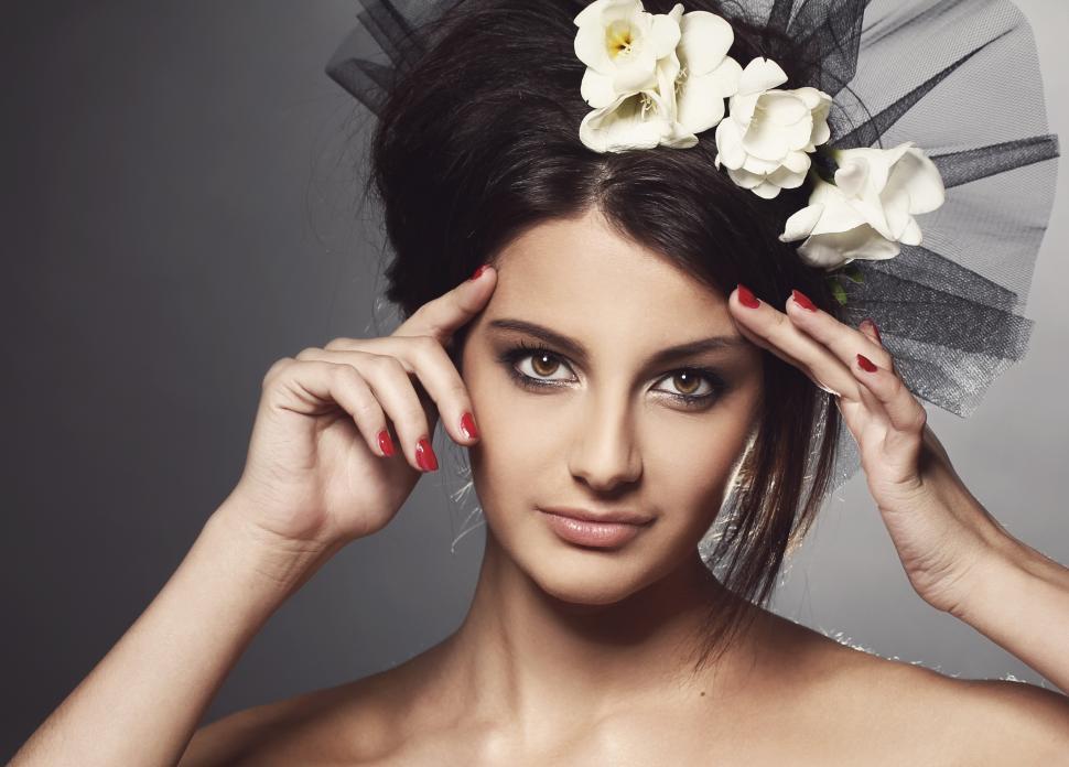 Free Image of Young woman in a black veil 