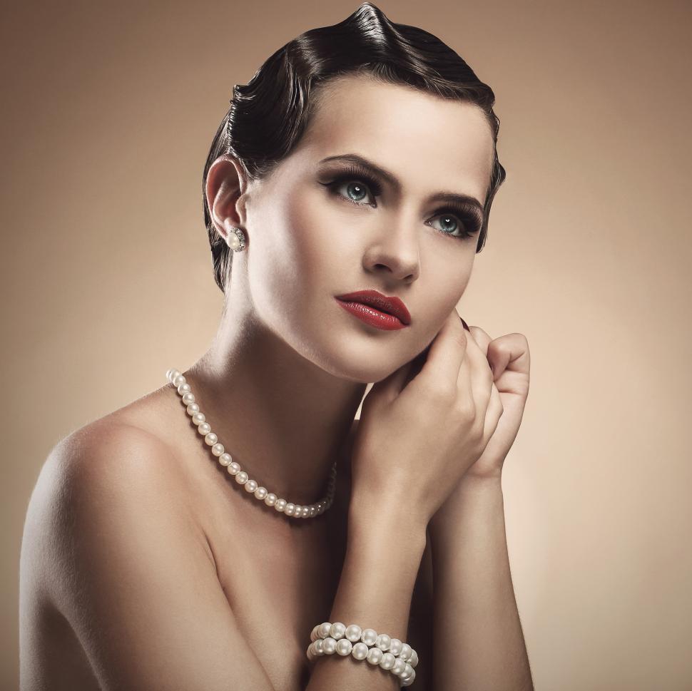 Free Image of Vintage. Beautiful woman with hands at her ear 