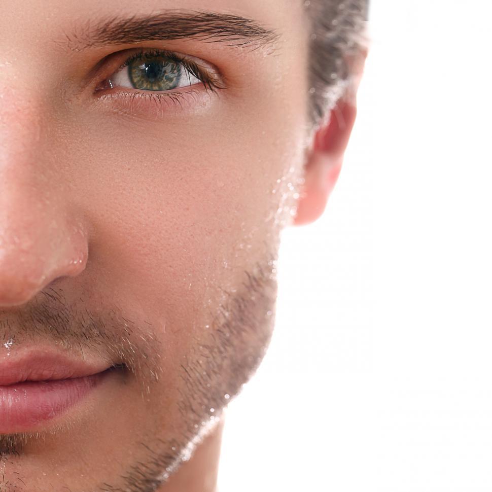 Free Image of Half face of handsome guy on a white background 