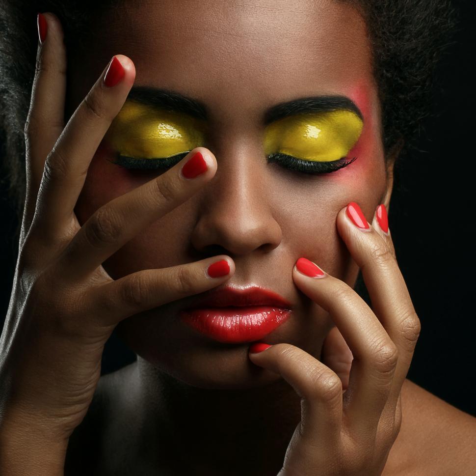 Free Image of Beautiful woman, hands on face, eyes closed 