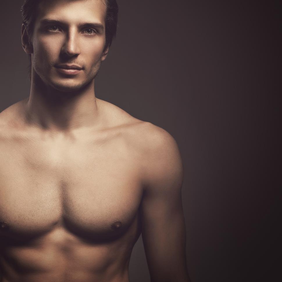 Free Image of Handsome guy with fit body, off center composition  