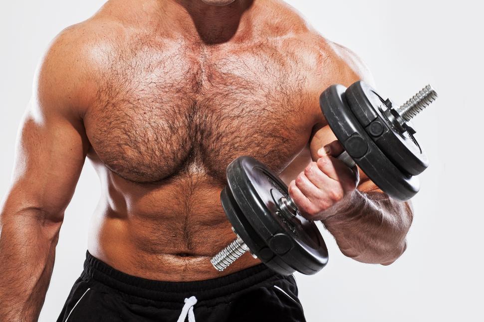 Free Image of Fitness. Man with one dumbbell 