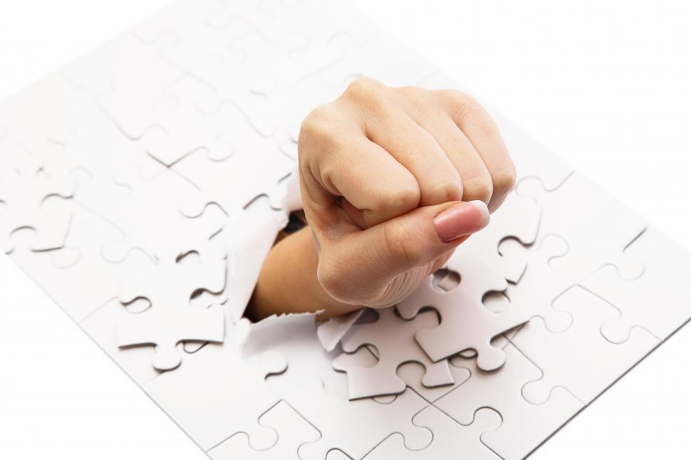Free Image of Fist Punches Through White puzzle 