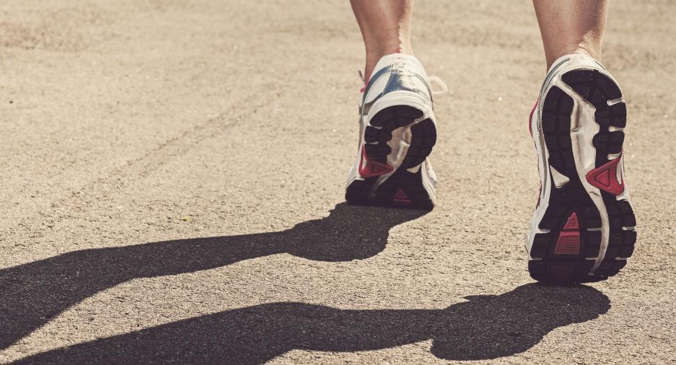 Free Image of Feet of a runner on the street 