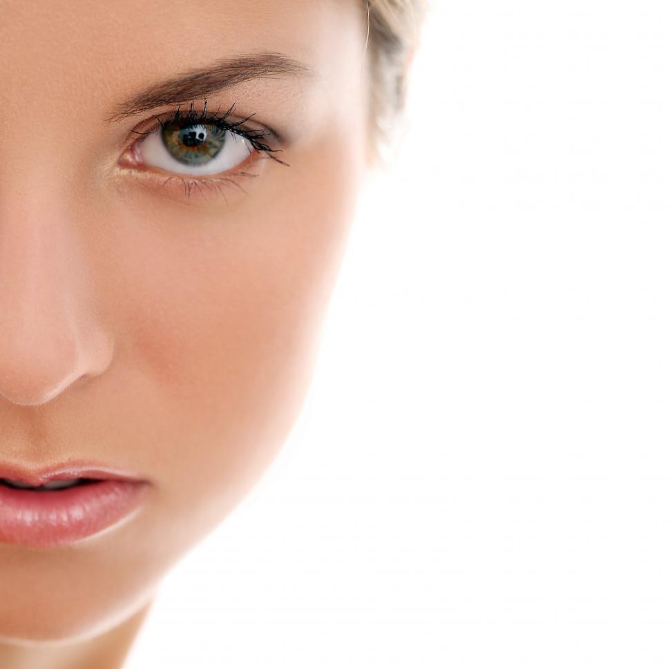 Free Image of Half-face view of girl on a white background 