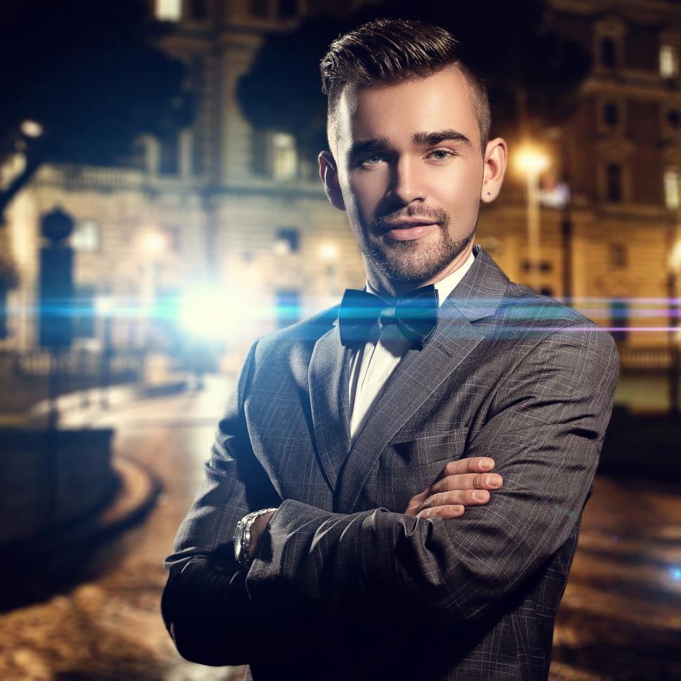 Free Image of Fashion, luxury. Adult gentleman standing on the street, well dressed 