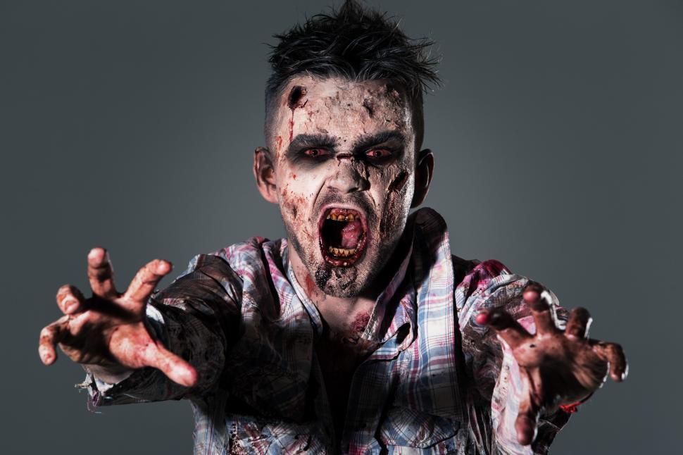 Free Image of Scary zombie reaching out - cosplay 