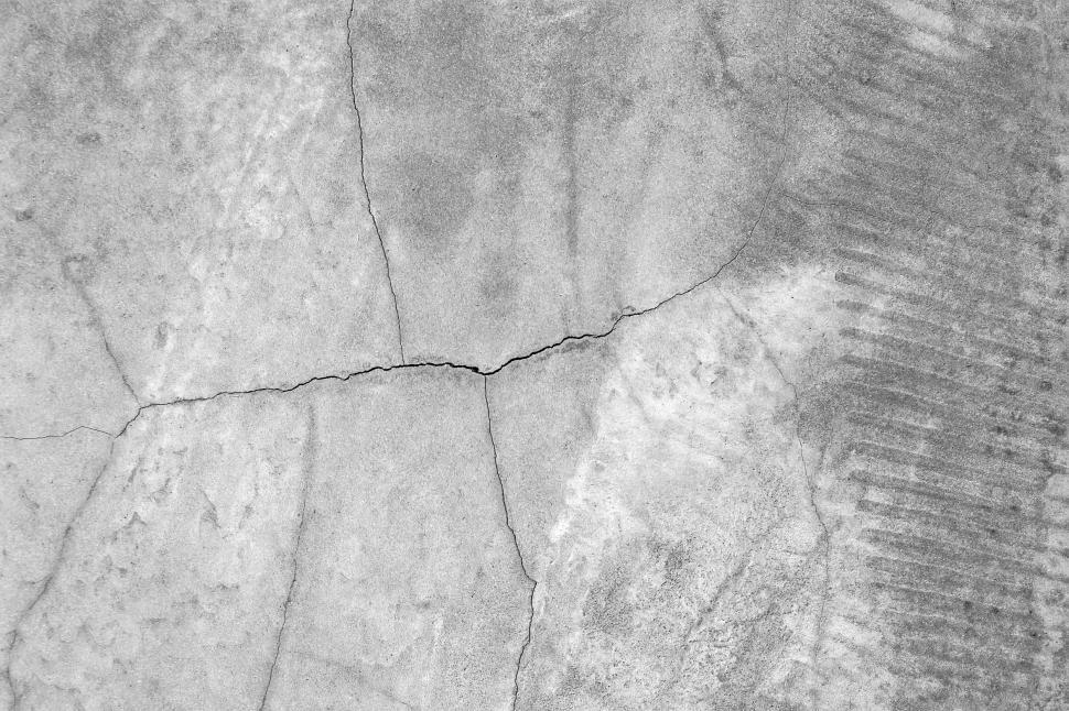 Free Image of Blank cracked grey concrete texture  