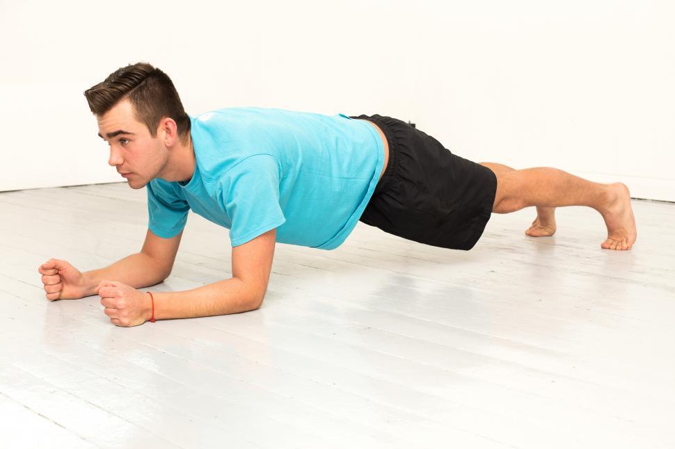 Free Image of Young man planking 