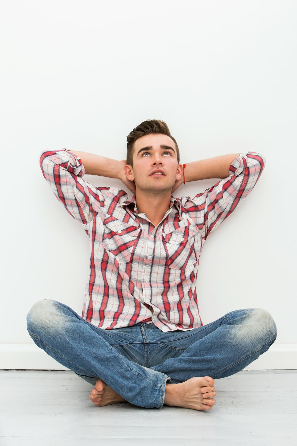 Free Image of Guy on the floor pondering life 
