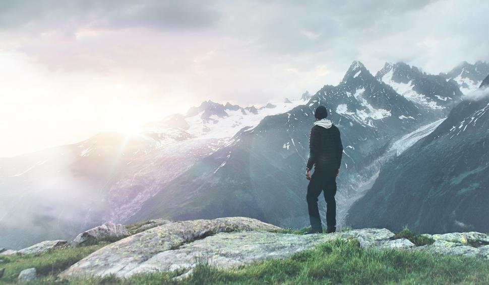 Free Image of Hiker on Top of Mountain Scanning the Horizon - Outdoors 