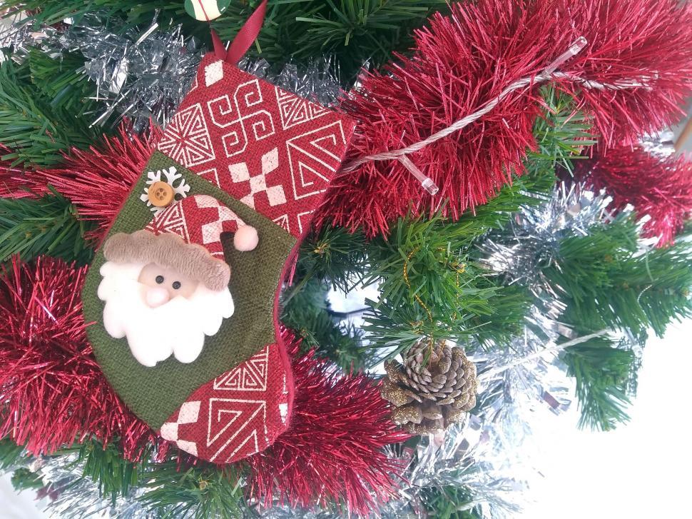 Free Image of Santa Claus Stocking in Xmas Tree  