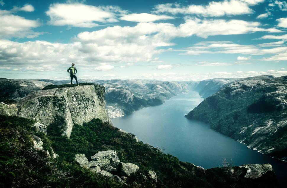 Free Image of Lone Hiker at Summit Looking Into the Horizon - Great Outdoors 