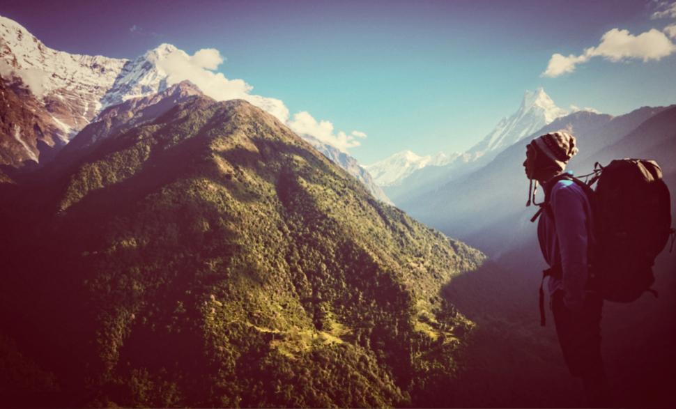Free Image of Hiker Facing the Mountains - High Altitude - Hazy Looks 