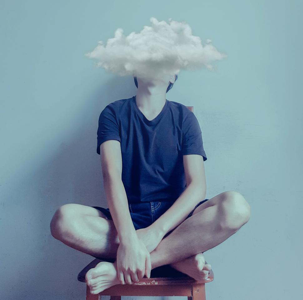 Free Image of Feeling Blue - Sadness - Teen with Dark Clouds Over Head 
