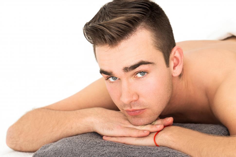 Free Image of Man laying in spa 